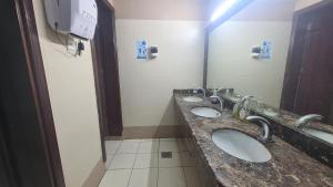 Koupelna v ubytování فندق لؤلؤة الشروق