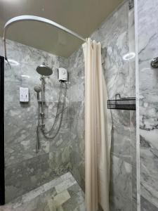 Ένα μπάνιο στο Cozy Condotel Maikhao