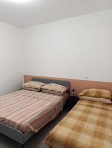 Postel nebo postele na pokoji v ubytování Villa Flamingo B&B
