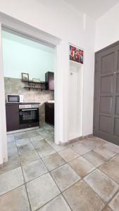 Kuchyň nebo kuchyňský kout v ubytování Citycenter Comfy Apartment + 1 fotografie