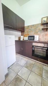 Kuchyň nebo kuchyňský kout v ubytování Citycenter Comfy Apartment