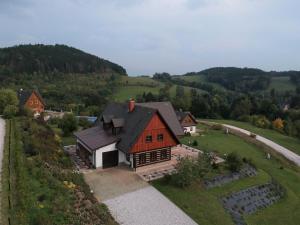 an aerial view of a house on a hill at Stupná Holiday Home with Garden in Vidochov