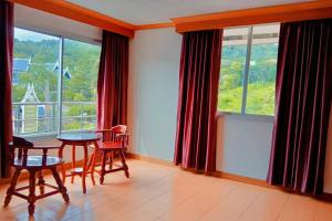 En balkon eller terrasse på Haweli Restaurant & Guest House