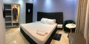 Ένα ή περισσότερα κρεβάτια σε δωμάτιο στο Hospedaria Urivic, Zango 3