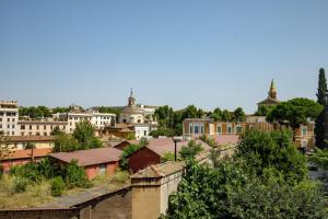 a view of a city with buildings and trees at Rome for Two in Rome