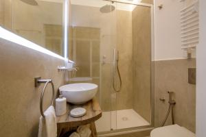 a bathroom with a shower and a sink and a toilet at Rome for Two in Rome +64 photos