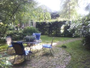 Вътрешен двор или друго открито пространство в Bed & Breakfast Onder Dak