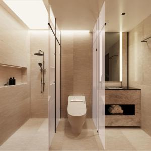 ein Badezimmer mit weißer Toilette und Dusche in der Unterkunft PureJoy Hotel Saigon in Ho-Chi-Minh-Stadt