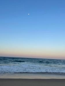 a view of the ocean from the beach at Casa Baleia Azul 8A Ponta Mamoli in Ponta Mamoli
