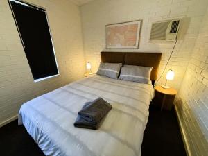 Postel nebo postele na pokoji v ubytování Corporate 3 Bedroom Apartment