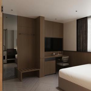 TV a/nebo společenská místnost v ubytování PureJoy Hotel Saigon + 16 fotografií