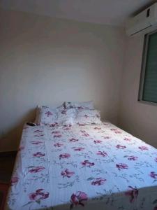 Ένα ή περισσότερα κρεβάτια σε δωμάτιο στο Apartamento