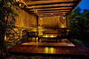 a patio with a table and chairs under a pergola at NOA - Sungu 1 in Istanbul