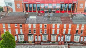 an overhead view of a large brick building at Stunning 2 Bedroom 6 Guest Flat by Anfield Stadium in Liverpool