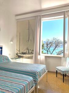 Postel nebo postele na pokoji v ubytování Villa With Private Sea Access In Portofino