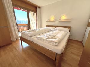 Postel nebo postele na pokoji v ubytování Château 26