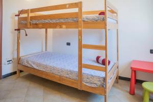 Ένα ή περισσότερα κρεβάτια σε δωμάτιο στο 047B - Casa Le Grigue, tra le Colline e il Mare di Sestri a 10 Minuti di auto dal Mare