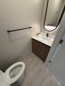 a bathroom with a toilet and a sink at New 1Bed 1 bath Ocean view in Miami Beach