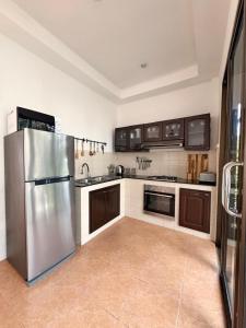 Kuchyň nebo kuchyňský kout v ubytování Villa Mar Koh Tao