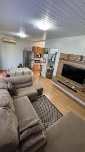 O zonă de relaxare la Casa 3 quartos, até 6 pessoas cataratas