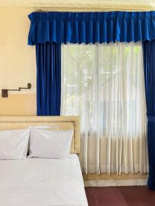 Una cama o camas en una habitación de NamRoom at Margot Jaksa