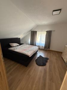 En eller flere senge i et værelse på BM Wohnung