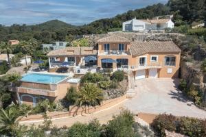 an aerial view of a house with a swimming pool at Seaside Villa With Panoramic Views In Les Îles D'or in La Londe-les-Maures