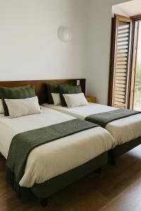 Postel nebo postele na pokoji v ubytování Apartamentos Granada Tropical + 120 fotografií