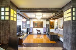 a living room with a couch and a table at Tokyo Luxury apartment in Odesa