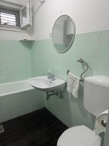 Koupelna v ubytování Apartmani Tina + 17 fotografií