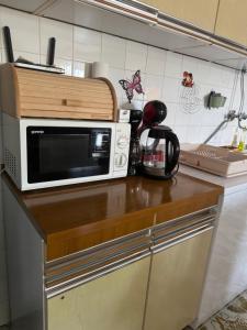 Kuchyň nebo kuchyňský kout v ubytování Apartmani Tina