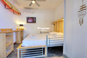 Postel nebo postele na pokoji v ubytování Kozy Corallines 35m2 - La Saline-les-Bains + 9 fotografií