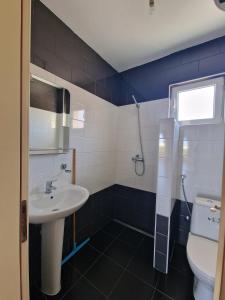 Ένα μπάνιο στο Ago Apartmani