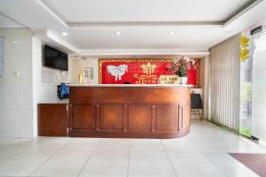 Μια τηλεόραση ή/και κέντρο ψυχαγωγίας στο Belvilla Near Lotte Mart Formerly Nam Phuong Hoang Hau +19 φωτογραφίες