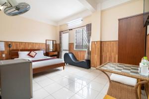 Ένα ή περισσότερα κρεβάτια σε δωμάτιο στο Belvilla Near Lotte Mart Formerly Nam Phuong Hoang Hau