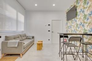 Televisyen dan/atau pusat hiburan di Apartamentos MYE by Clabao