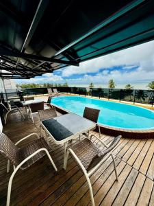 Bazén v ubytování Mar Do Cabo Branco 210 nebo v jeho okolí