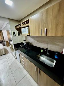 Kuchyň nebo kuchyňský kout v ubytování Mar Do Cabo Branco 210