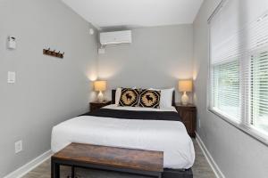 a small bedroom with a bed and a table at Gum Tree 3 with Wintergreen Advantage in Wintergreen +14 photos