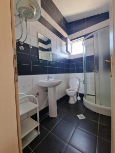 Ένα μπάνιο στο Ago Apartmani