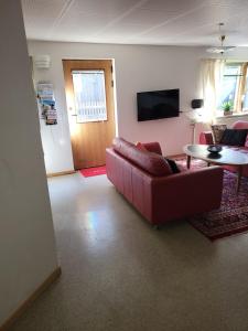 Μια τηλεόραση ή/και κέντρο ψυχαγωγίας στο Nice and cheap apartment, Torshavn +7 φωτογραφίες