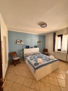 Ένα ή περισσότερα κρεβάτια σε δωμάτιο στο Casa Agata - La Casa in Sardegna