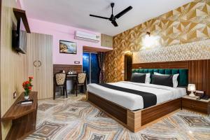 Ένα ή περισσότερα κρεβάτια σε δωμάτιο στο Hotel O Fifteen +21 φωτογραφίες