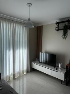 TV a/nebo společenská místnost v ubytování Madrid