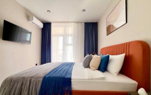 Ένα ή περισσότερα κρεβάτια σε δωμάτιο στο Bella Vista Suites
