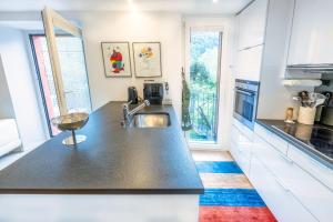 a kitchen with a sink and a counter top at Dongio, Acquarossa in Dongio