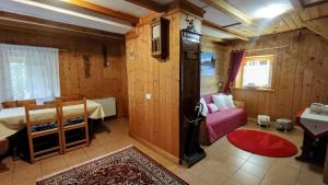 Ένα ή περισσότερα κρεβάτια σε δωμάτιο στο CaLella Vacanze Dolomiti