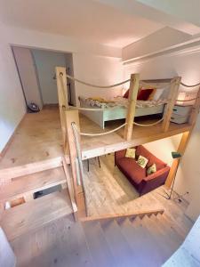 an overhead view of a room with two bunk beds at Stay Inn Central Cluj in Cluj-Napoca