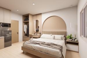 a bedroom with a large bed and a kitchen at Abundant Eco Hostel in Laguna Phuket