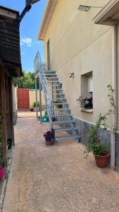 a set of stairs on the side of a building at Casa ELPI in Guardiola